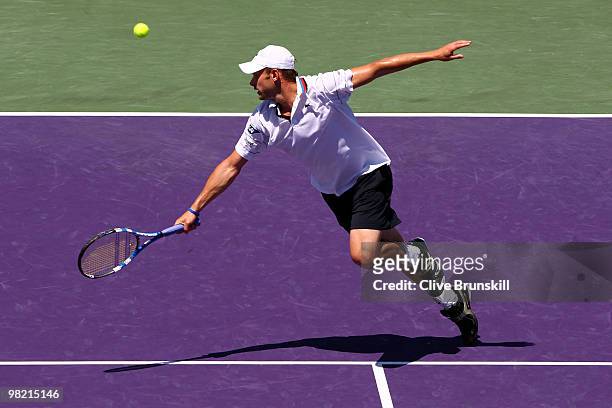Andy Roddick of the United States fails to return a shot against Rafael Nadal of Spain during day eleven of the 2010 Sony Ericsson Open at Crandon...