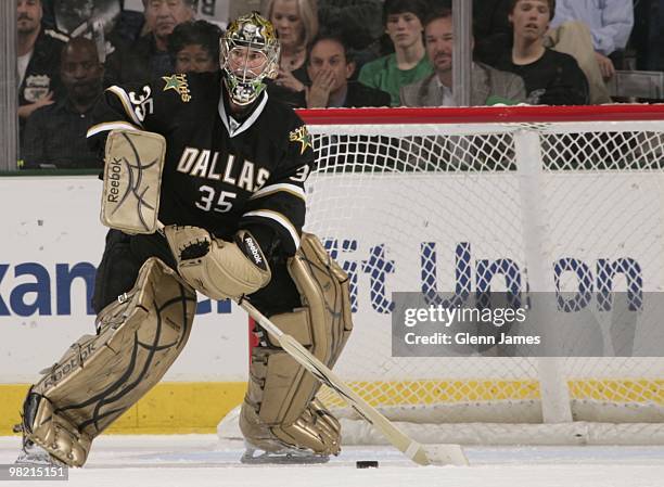 Marty Turco of the Dallas Stars handles the puck against the San Jose Sharks on March 31, 2010 at the American Airlines Center in Dallas, Texas.