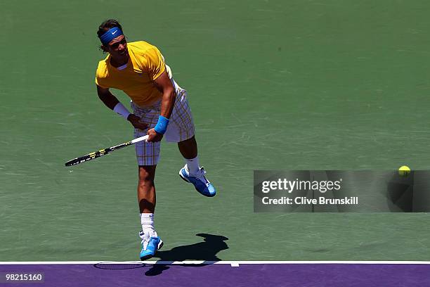 Rafael Nadal of Spain serves against Andy Roddick of the United States during day eleven of the 2010 Sony Ericsson Open at Crandon Park Tennis Center...