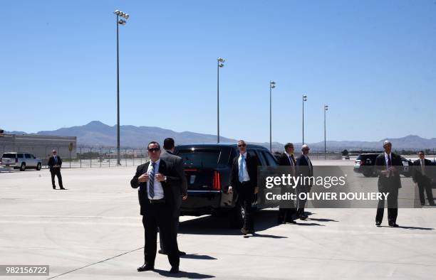 Secret Service agents stand at McCarran International Airport as US President Donald Trump arrives aboard Air Force One in Las Vegas, Nevada, on June...