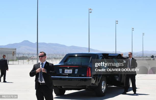 Secret Service agents stand at McCarran International Airport as US President Donald Trump arrives aboard Air Force One in Las Vegas, Nevada, on June...