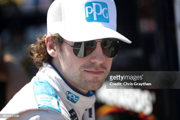Ryan Blaney, driver of the PPG Ford, stands on the grid during qualifying for the Monster Energy NASCAR Cup Series Toyota/Save Mart 350 at Sonoma...