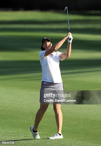 Juli Inkster of the USA plays her second shot at the 10th hole during the second round of the 2010 Kraft Nabisco Championship, on the Dinah Shore...