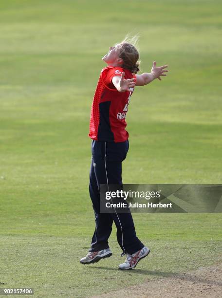 Heather Knight of England celebrates the Wicket of Amy Satterthwaite of New Zealand during the International T20 Tri-Series match between England...