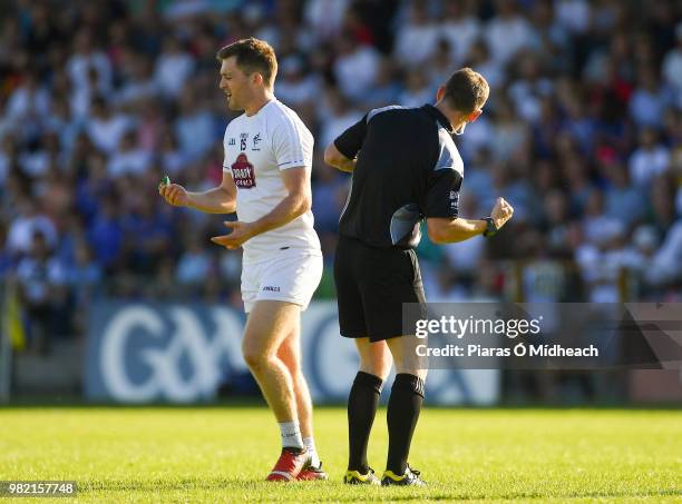 Longford , Ireland - 23 June 2018; Niall Kelly of Kildare leaves the field after being shown the black card by referee Joe McQuillan early in the...