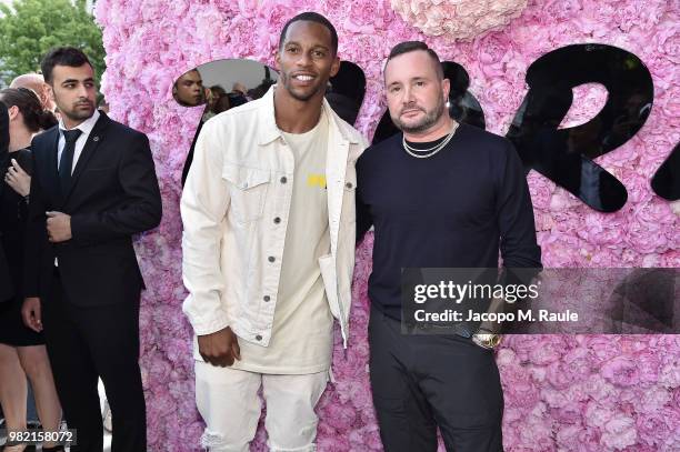 Victor Cruz and Kim Jones attend the Dior Homme Menswear Spring/Summer 2019 show as part of Paris Fashion Week on June 23, 2018 in Paris, France.