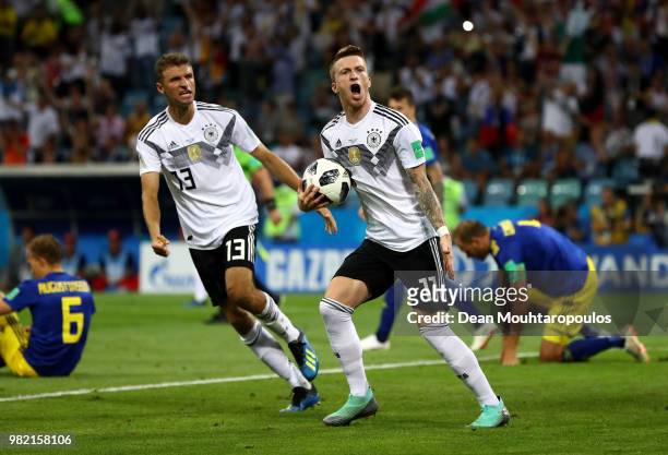 Marco Reus of Germany celebrates with Thomas Mueller after scoring his sides opening goal to make the score 1-1 during the 2018 FIFA World Cup Russia...
