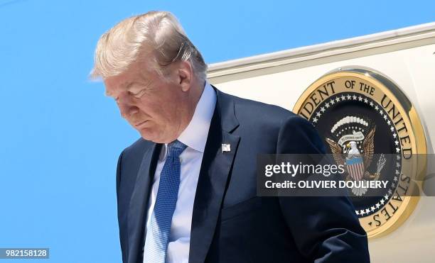 President Donald Trump arrives aboard Air Force One at McCarran International Airport in Las Vegas, Nevada, on June 23, 2018. - Trump will be...