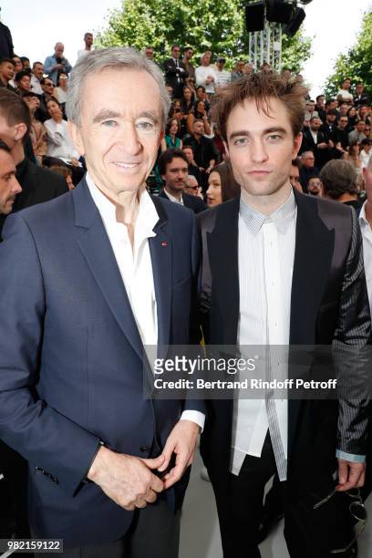 Owner of LVMH Luxury Group Bernard Arnault and Robert Pattinson attend the Dior Homme Menswear Spring/Summer 2019 show as part of Paris Fashion Week...