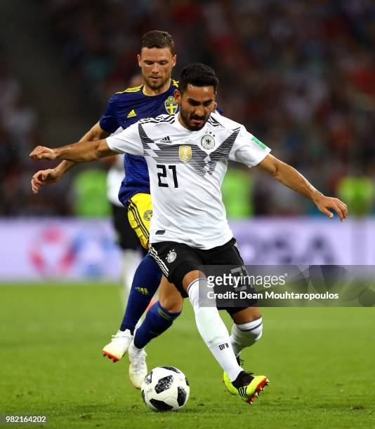 Ilkay Guendogan of Germany is tackled by Marcus Berg of Sweden during the 2018 FIFA World Cup Russia group F match between Germany and Sweden at...