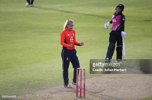 Sophie Ecclestone of England acknowledges the wicket of Anna Peterson of New Zealand during the International T20 Tri-Series match between England...