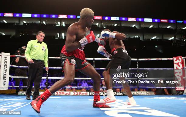 Paul Kamanga and Ohara Davies during the WBC International Super Light Weight Championship match at The O2, London