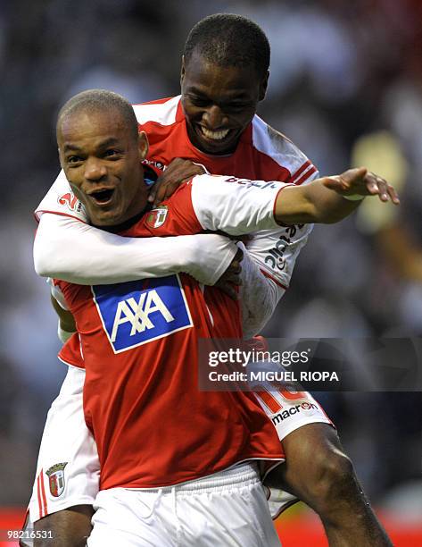 Braga´s Cameroonian forward Albert Meyong celebrates with teammate, Colombia Wason Renteria after scoring against Vitoria SC during their Portuguese...