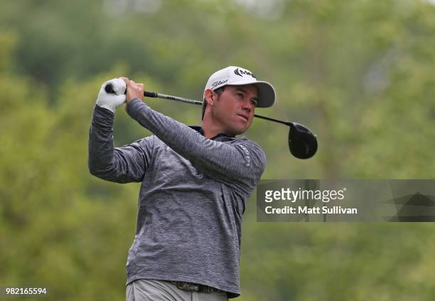 Brian Harman watches his tee shot on the fourth hole during the third round of the Travelers Championship at TPC River Highlands on June 23, 2018 in...