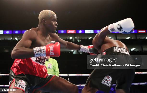 Paul Kamanga and Ohara Davies during the WBC International Super Light Weight Championship match at The O2, London.