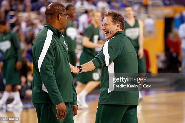 Head coach Tom Izzo of the Michigan State Spartans talks with assistant coach Mike Garland during practice prior to the 2010 Final Four of the NCAA...