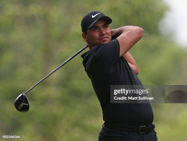 Jason Day of Australia watches his tee shot on the fourth hole during the third round of the Travelers Championship at TPC River Highlands on June...