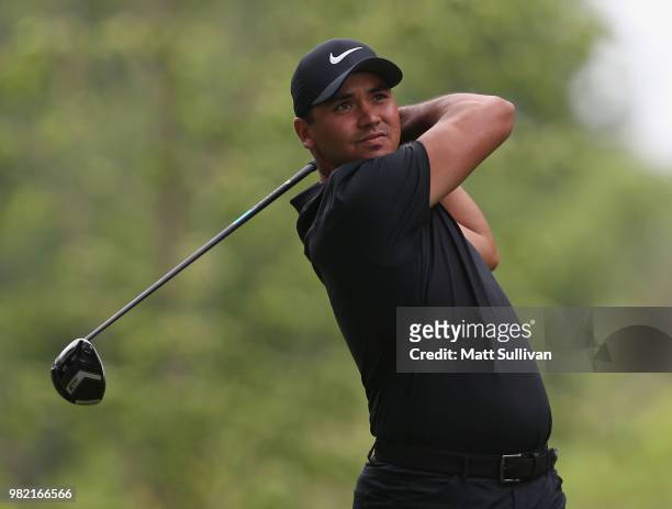Jason Day of Australia watches his tee shot on the fourth hole during the third round of the Travelers Championship at TPC River Highlands on June...