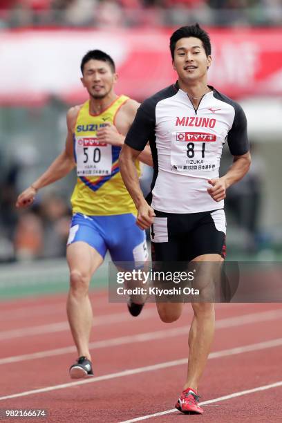Shota Iizuka competes in the Men's 200m heat on day two of the 102nd JAAF Athletic Championships at Ishin Me-Life Stadium on June 23, 2018 in...