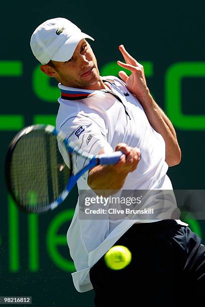 Andy Roddick of the United States returns a shot against Rafael Nadal of Spain during day eleven of the 2010 Sony Ericsson Open at Crandon Park...