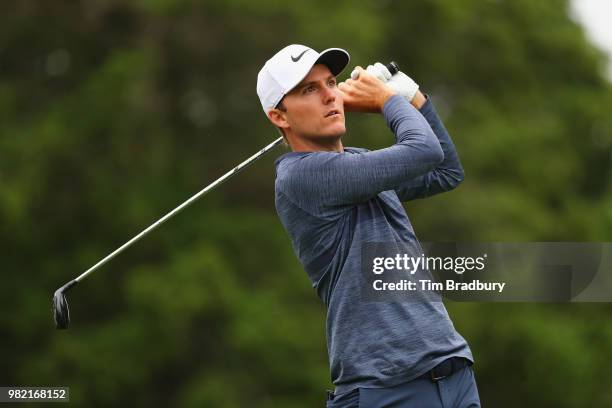 Russell Henley of the United States plays his shot from the fifth tee during the third round of the Travelers Championship at TPC River Highlands on...