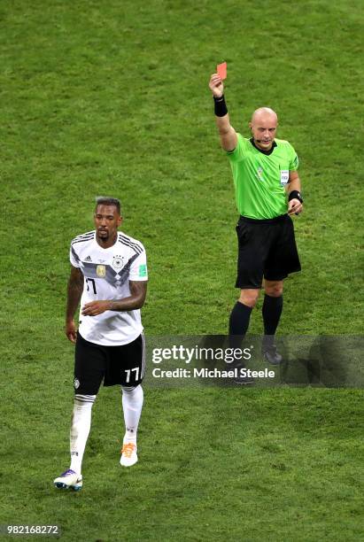 Jerome Boateng of Germany is shown a redcard by referee Szymon Marciniak during the 2018 FIFA World Cup Russia group F match between Germany and...