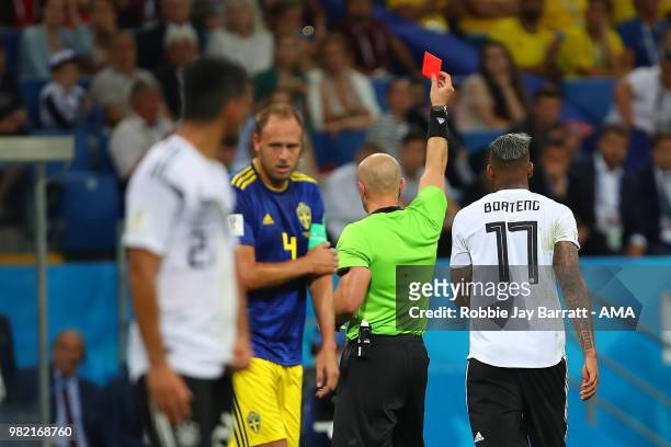 Jerome Boateng of Germany is shown a red card by Referee Szymon Marciniak during the 2018 FIFA World Cup Russia group F match between Germany and...