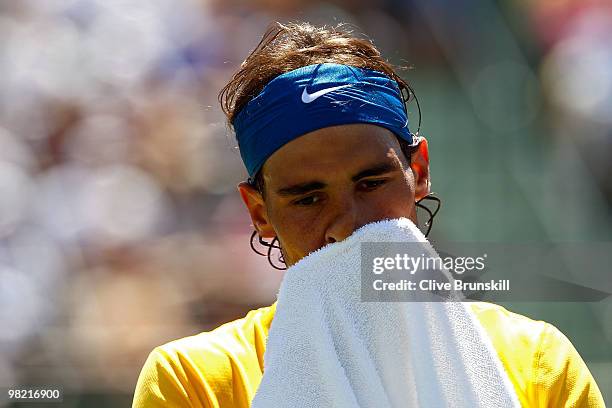 Rafael Nadal of Spain looks on against Andy Roddick of the United States during day eleven of the 2010 Sony Ericsson Open at Crandon Park Tennis...