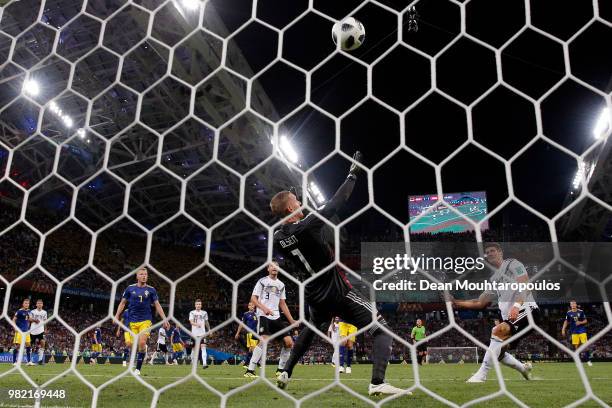 Robin Olsen of Sweden makes a save from Mario Gomez of Germany during the 2018 FIFA World Cup Russia group F match between Germany and Sweden at...