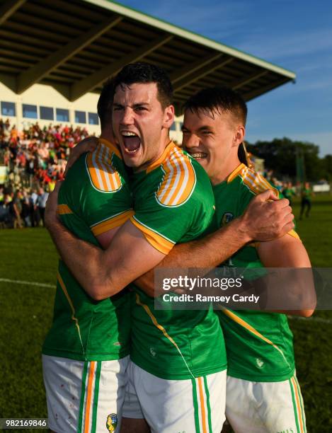 Carrick-on-Shannon , Ireland - 23 June 2018; Leitrim's Damien Moran, centre, and Darragh Rooney celebrate their victory in the GAA Football...