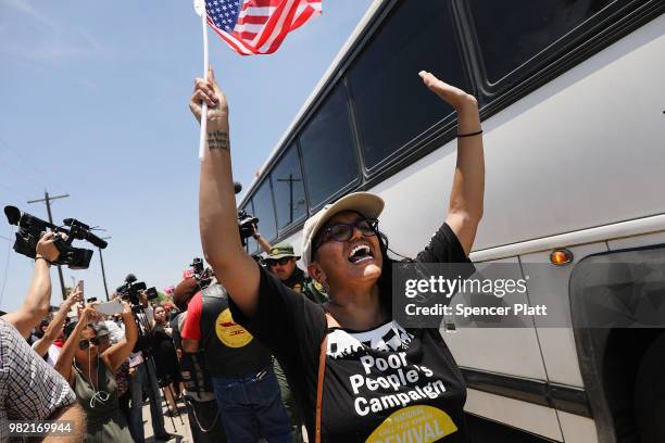 Protesters against the Trump administration's border policies try to block a bus carrying migrant children out of a U.S. Customs and Border...