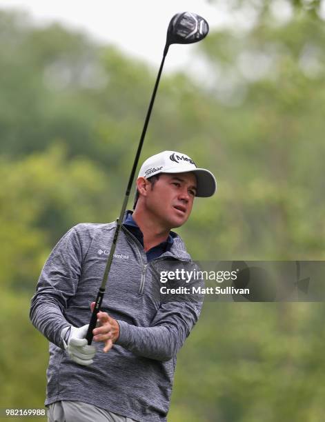 Brian Harman watches his tee shot on the fourth hole during the third round of the Travelers Championship at TPC River Highlands on June 23, 2018 in...