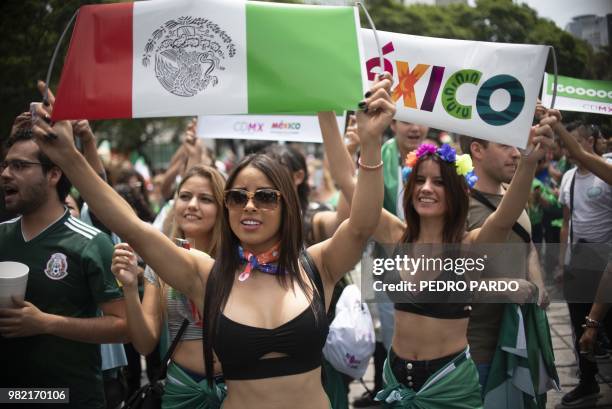 Fans of Mexico celebrate at Angel de la Independencia monument in Mexico City after Mexico beat South Korea 2-1 in their World Cup group match, on...