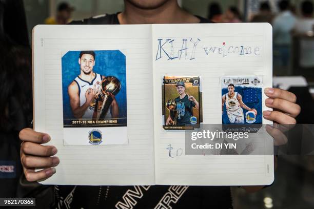 Player Klay Thompson of the Golden State Warriors is welcomed by fans at Beijing Capital International Airport on June 24, 2018 in Beijing, China.