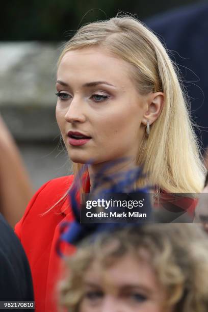 Sophie Turner arriving at Rayne Church in Kirkton on Rayne for the wedding of Kit Harrington and Rose Leslie on June 23, 2018 in Aberdeen, Scotland.