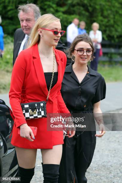 Sophie Turner and Maisie Williams arriving at Rayne Church in Kirkton on Rayne for the wedding of Kit Harrington and Rose Leslie on June 23, 2018 in...