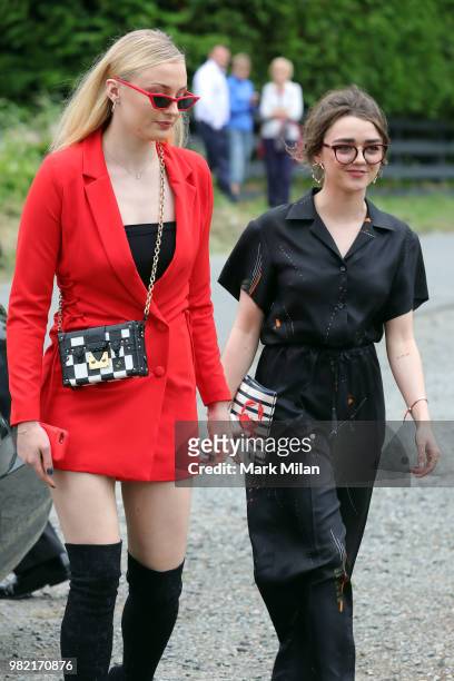 Sophie Turner and Maisie Williams arriving at Rayne Church in Kirkton on Rayne for the wedding of Kit Harrington and Rose Leslie on June 23, 2018 in...