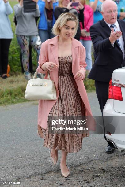 Emilia Clarke arriving at Rayne Church in Kirkton on Rayne for the wedding of Kit Harrington and Rose Leslie on June 23, 2018 in Aberdeen, Scotland.