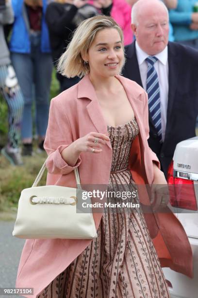 Emilia Clarke arriving at Rayne Church in Kirkton on Rayne for the wedding of Kit Harrington and Rose Leslie on June 23, 2018 in Aberdeen, Scotland.