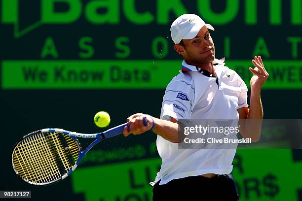 Andy Roddick of the United States returns a shot against Rafael Nadal of Spain during day eleven of the 2010 Sony Ericsson Open at Crandon Park...