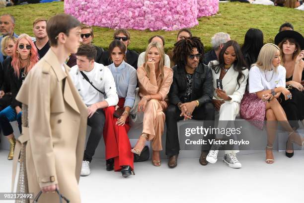 Front row from left to right, Brooklyn Beckham, Victoria Beckham, Kate Moss, Lenny Kravitz, Naomi Campbell, Yoon Ahn and Lou Doillon attend the Dior...