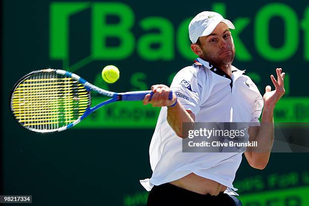 Andy Roddick of the United States returns a shot against Rafael Nadal of Spain during day eleven of the 2010 Sony Ericsson Open at Crandon Park...