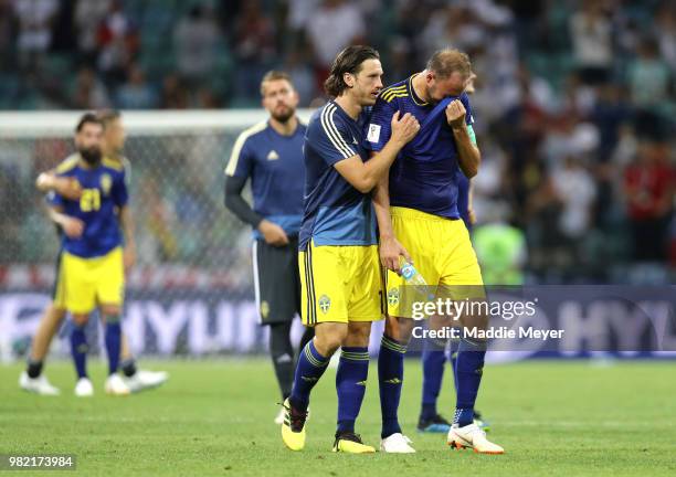 Andreas Granqvist of Sweden is consoled by teammate Gustav Svensson following the 2018 FIFA World Cup Russia group F match between Germany and Sweden...