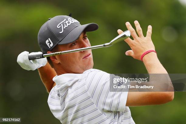 Justin Thomas of the United States plays his shot from the fifth tee during the third round of the Travelers Championship at TPC River Highlands on...
