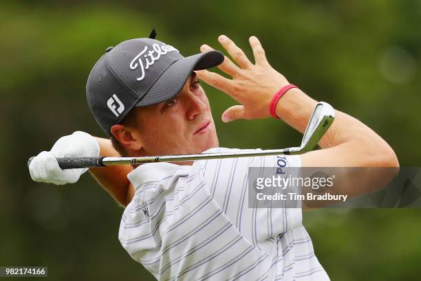 Justin Thomas of the United States plays his shot from the fifth tee during the third round of the Travelers Championship at TPC River Highlands on...