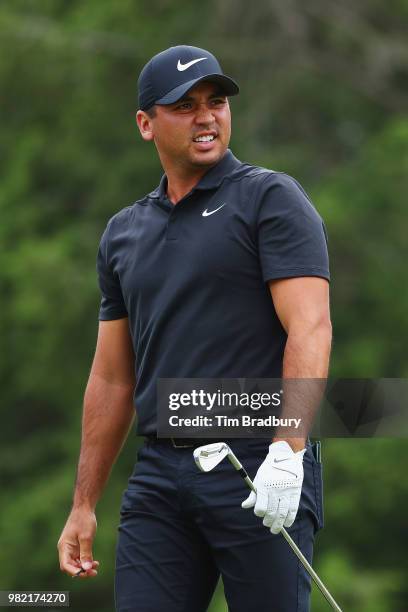 Jason Day of Australia reacts to his shot from the fifth tee during the third round of the Travelers Championship at TPC River Highlands on June 23,...