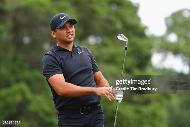Jason Day of Australia reacts to his shot from the fifth tee during the third round of the Travelers Championship at TPC River Highlands on June 23,...