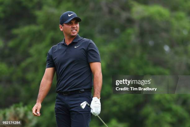 Jason Day of Australia reacts to his shot from the fifth tee during the third round of the Travelers Championship at TPC River Highlands on June 23,...