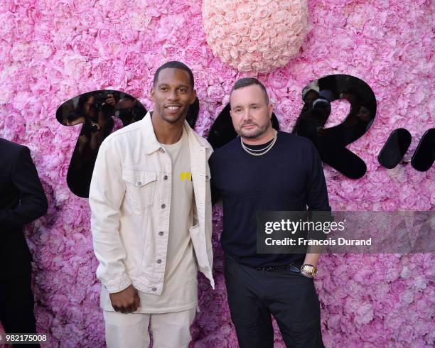 Victor Cruz and Kim Jones attend the Dior Homme Menswear Spring/Summer 2019 show as part of Paris Fashion Week on June 23, 2018 in Paris, France.