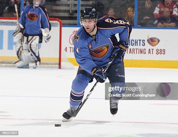 Rich Peverley of the Atlanta Thrashers carries the puck against the Nashville Predators at Philips Arena on March 9, 2010 in Atlanta, Georgia.